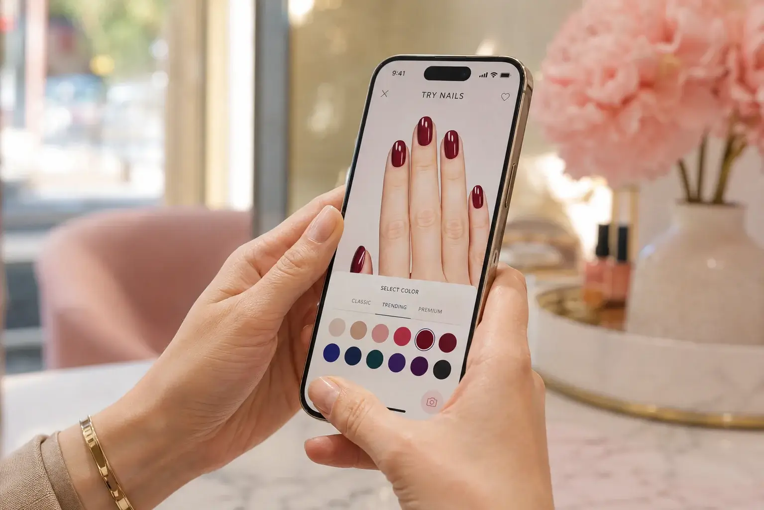 A client using a digital nail polish app on a smartphone to